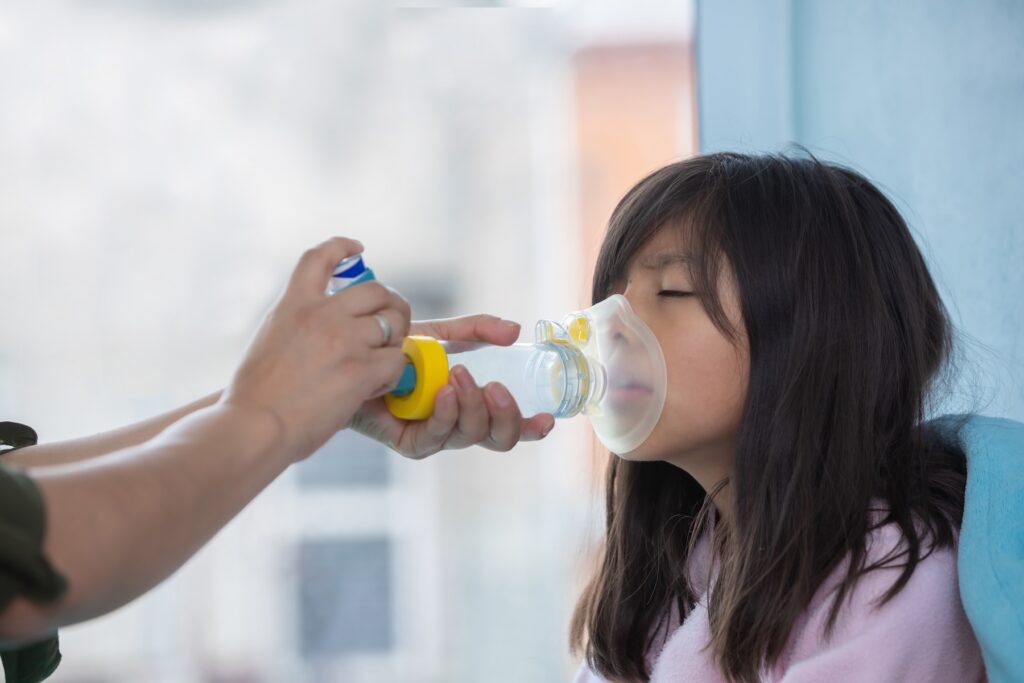 Child doing a treatment in child care for respiratory illness in louisiana.