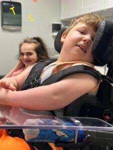 Young boy in wheelchair at special needs daycare